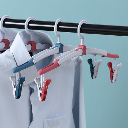 Travel folding hanger